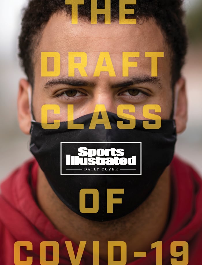 Pittman Jr., photographed at distance, in his mother-made mask.